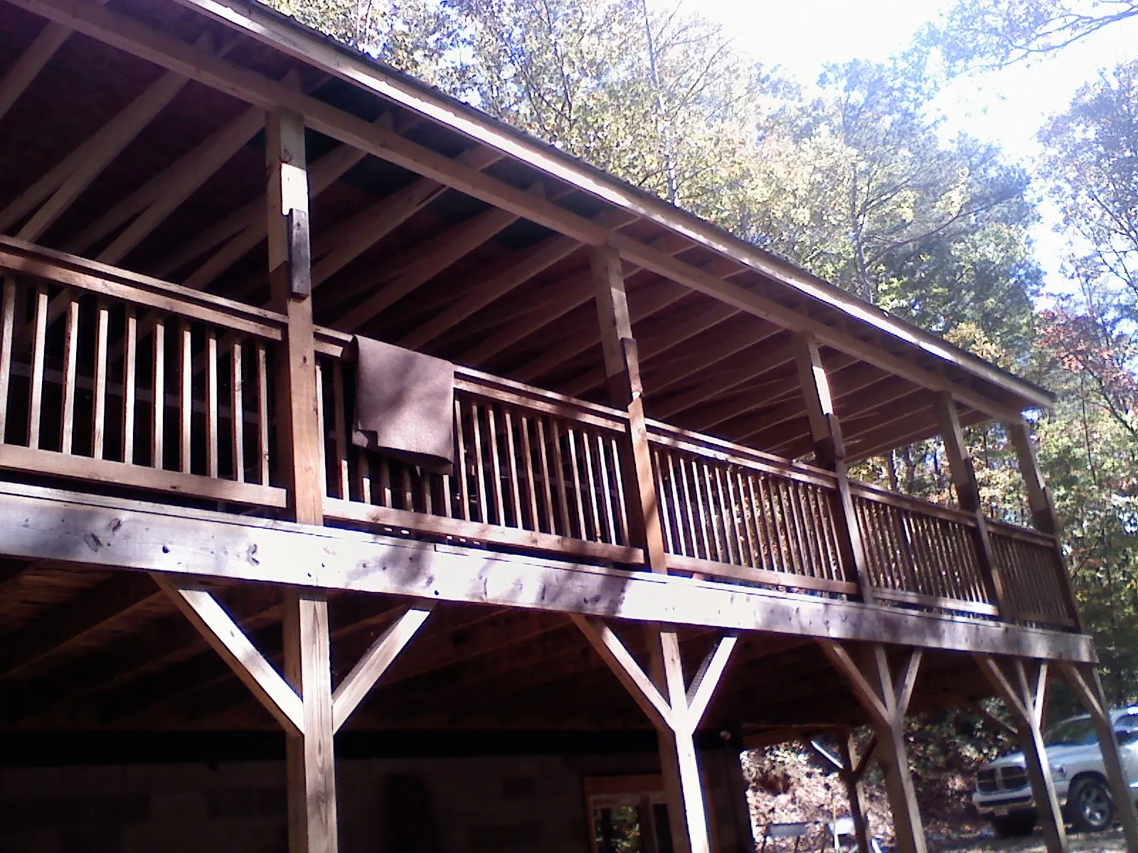 Timber framing under a new elevated porch and deck — Roof Leak Repair in Fort Valley by Roofing Brothers